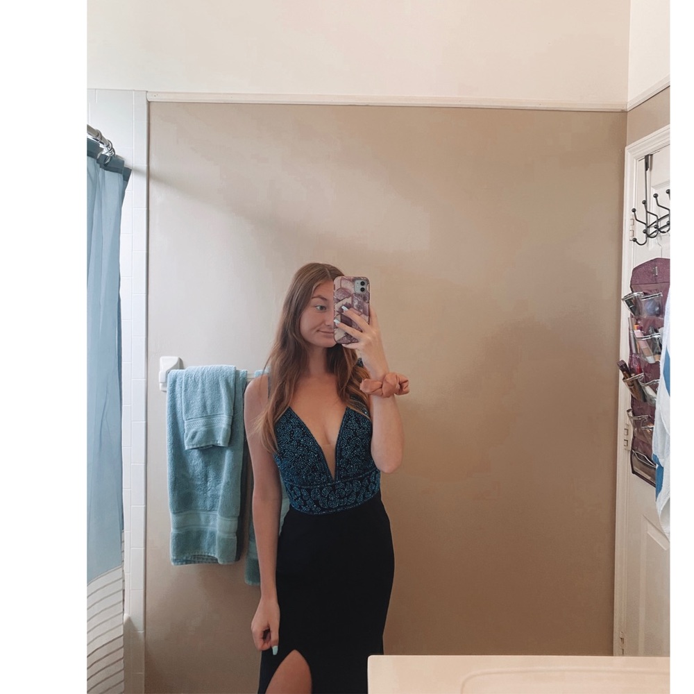 It’s a blue Vienna prom dress, number 8425.